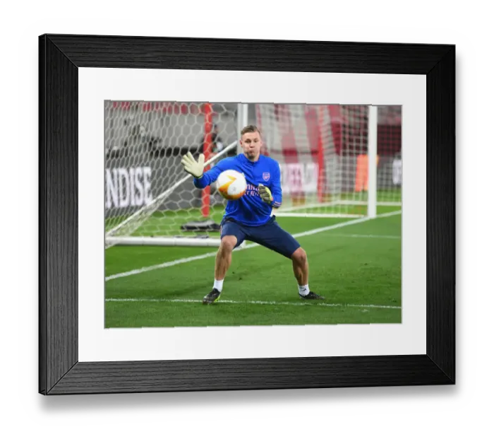 Framed Print : Arsenal's Bernd Leno Prepares for Olympiacos Clash in Empty Europa League Stadium Framed Print : Arsenal's Bernd Leno Prepares for Olympiacos Clash in Empty Europa League Stadium
