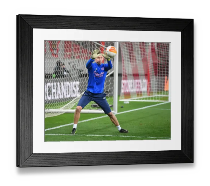 Framed Print : Arsenal's Bernd Leno Prepares for Olympiacos Clash in Empty Europa League Stadium Framed Print : Arsenal's Bernd Leno Prepares for Olympiacos Clash in Empty Europa League Stadium