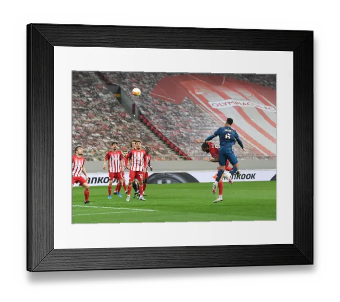 Framed Print : Gabriel Scores as Arsenal Takes 2-0 Lead Over Olympiacos in Europa League Round of 16 (Behind Closed Doors) Framed Print : Gabriel Scores as Arsenal Takes 2-0 Lead Over Olympiacos in Europa League Round of 16 (Behind Closed Doors)