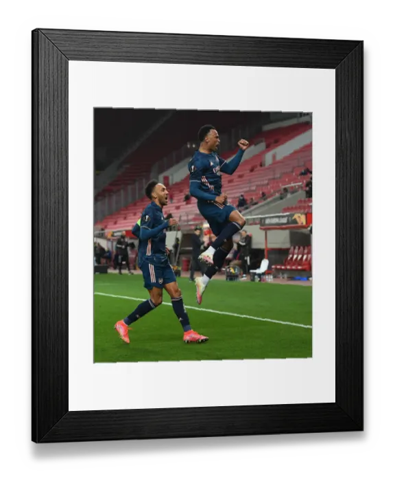 Framed Print : Arsenal's Gabriel and Aubameyang Celebrate Empty-Stadium Goals in Europa League Match vs. Olympiacos Framed Print : Arsenal's Gabriel and Aubameyang Celebrate Empty-Stadium Goals in Europa League Match vs. Olympiacos
