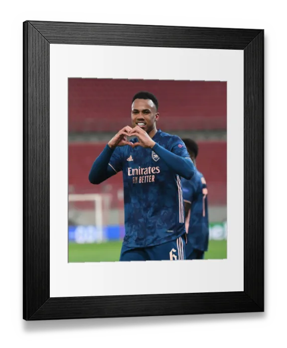 Framed Print : Gabriel's Brace: Arsenal Takes 2-0 Lead Over Olympiacos in Europa League Amidst Empty Stands