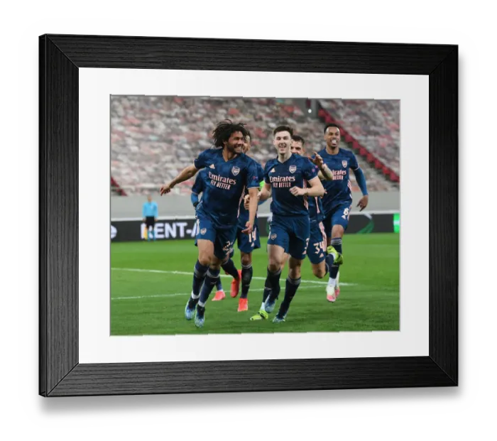Framed Print : Arsenal's Elneny and Tierney Celebrate Goals in Empty Olympiacos Stadium, Europa League Round of 16