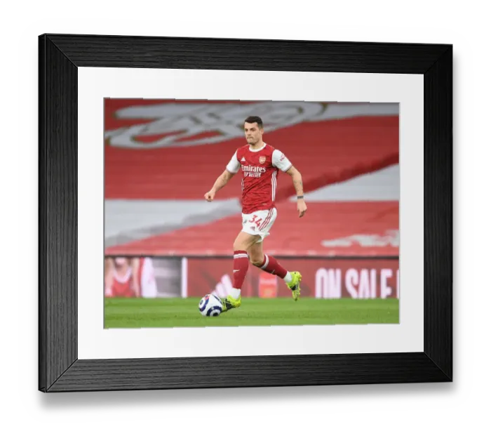 Framed Print : Arsenal's Granit Xhaka in Action Against Tottenham Amid Empty Emirates Stadium (Arsenal v Tottenham 2021)
