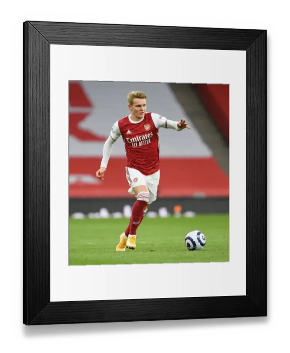 Framed Print : Martin Odegaard vs. Tottenham: A Battle at Empty Emirates in the Premier League 2020-21 Framed Print : Martin Odegaard vs. Tottenham: A Battle at Empty Emirates in the Premier League 2020-21