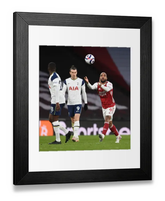Framed Print : Arsenal vs. Tottenham: A Rivalry Renewed in Empty Emirates Stadium