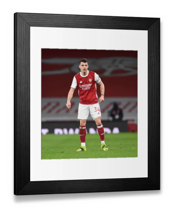 Framed Print : Granit Xhaka: Arsenal Star Shines at Empty Emirates in Premier League Clash Against Tottenham Hotspur, 2020-21 Framed Print : Granit Xhaka: Arsenal Star Shines at Empty Emirates in Premier League Clash Against Tottenham Hotspur, 2020-21