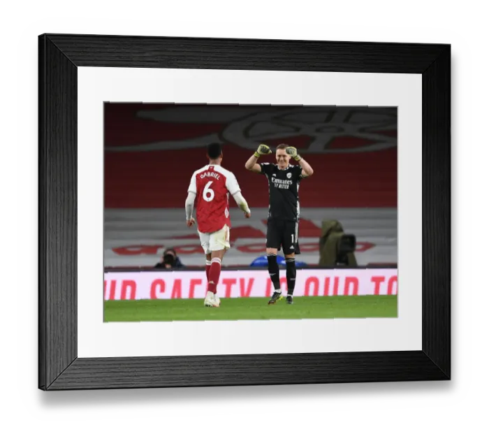 Framed Print : Arsenal Celebrate Win Against Tottenham Amidst Empty Emirates Stadium