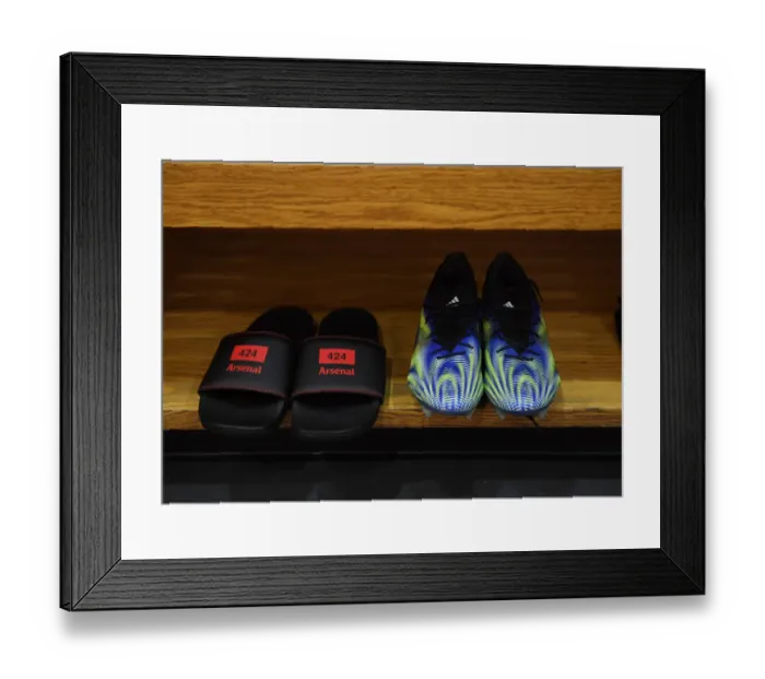 Framed Print : Arsenal vs. Tottenham: Kieran Tierney's Empty Emirates Boots - Premier League Clash Amidst COVID-19 Restrictions (2020-21)
