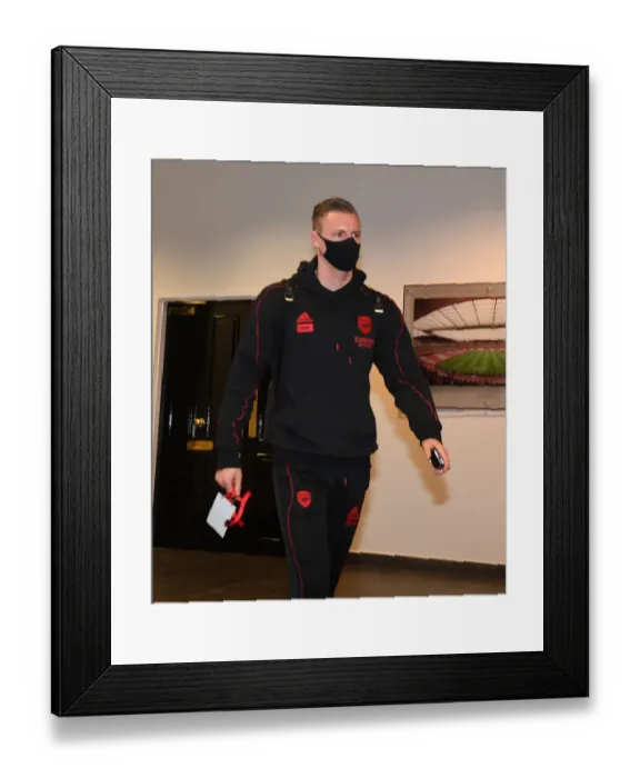 Framed Print : Arsenal's Bernd Leno Arrives at Empty Emirates Stadium Ahead of Arsenal v Tottenham Hotspur Match, 2021 Premier League
