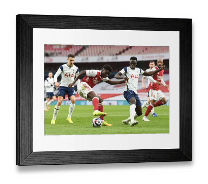 Framed Print : Saka vs. Reguilon and Sanchez: A Rivalry Emerges in Empty Emirates Stadium - Arsenal vs. Tottenham Showdown Framed Print : Saka vs. Reguilon and Sanchez: A Rivalry Emerges in Empty Emirates Stadium - Arsenal vs. Tottenham Showdown