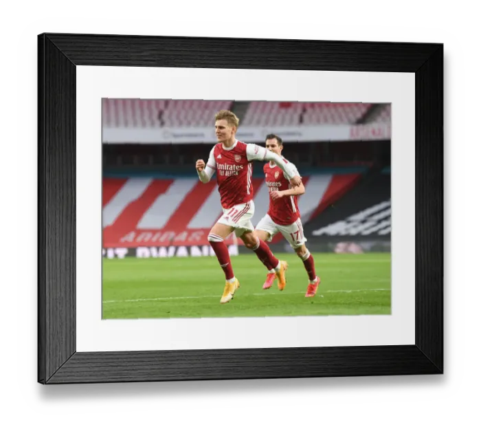 Framed Print : Martin Odegaard Scores Historic First Arsenal Goal Against Tottenham in Empty Emirates Stadium Framed Print : Martin Odegaard Scores Historic First Arsenal Goal Against Tottenham in Empty Emirates Stadium
