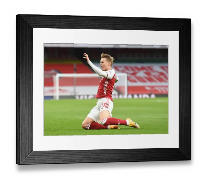 Framed Print : Martin Odegaard Scores Historic First Goal for Arsenal Against Tottenham in Empty Emirates Stadium