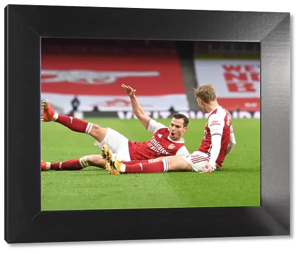 Martin Odegaard Scores the Opener: Arsenal vs. Tottenham Hotspur in Emirates Stadium (2020-21)