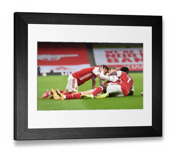 Framed Print : Arsenal Celebrate Martin Odegaard's Goal Against Tottenham in Empty Emirates Stadium