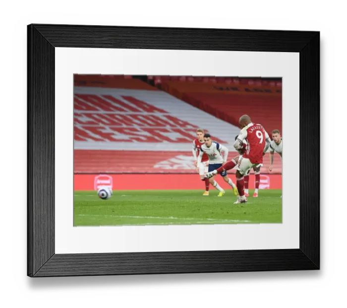 Framed Print : Arsenal's Alex Lacazette Scores Penalty in Empty Emirates Stadium Against Tottenhotspur (2020-21) Framed Print : Arsenal's Alex Lacazette Scores Penalty in Empty Emirates Stadium Against Tottenhotspur (2020-21)