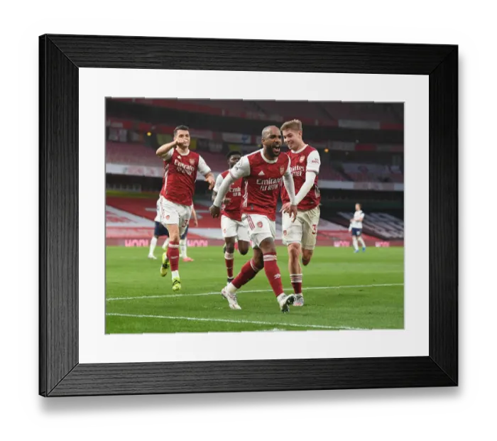 Framed Print : Arsenal's Lacazette, Xhaka, and Smith Rowe Celebrate Goals Against Tottenham in Empty Emirates Stadium Framed Print : Arsenal's Lacazette, Xhaka, and Smith Rowe Celebrate Goals Against Tottenham in Empty Emirates Stadium