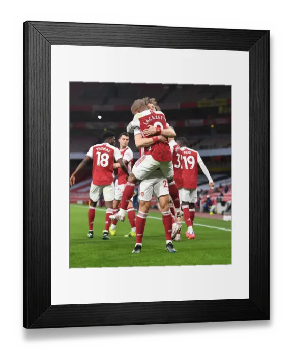Framed Print : Alexis Lacazette and David Luiz Celebrate Arsenal's Win Against Tottenham Hotspur in Empty Emirates Stadium (2020-21) Framed Print : Alexis Lacazette and David Luiz Celebrate Arsenal's Win Against Tottenham Hotspur in Empty Emirates Stadium (2020-21)
