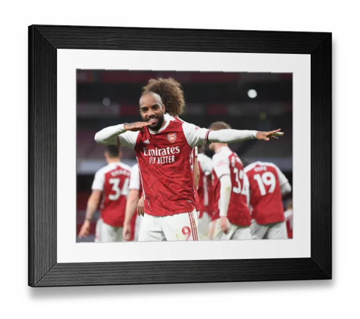 Framed Print : Alexis Lacazette Scores in Empty Emirates: Arsenal's Second Goal Against Tottenham Hotspur (2020-21)