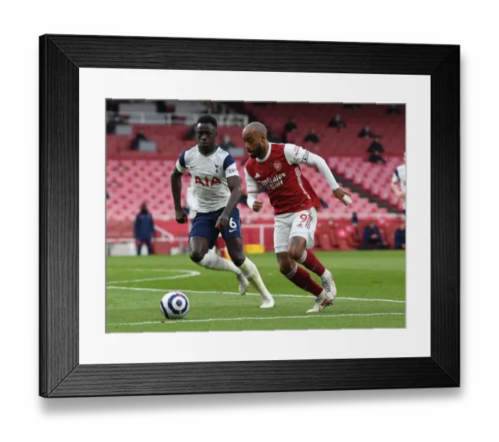 Framed Print : Arsenal vs. Tottenham: Lacazette vs. Sanchez Clash in Premier League Showdown Framed Print : Arsenal vs. Tottenham: Lacazette vs. Sanchez Clash in Premier League Showdown