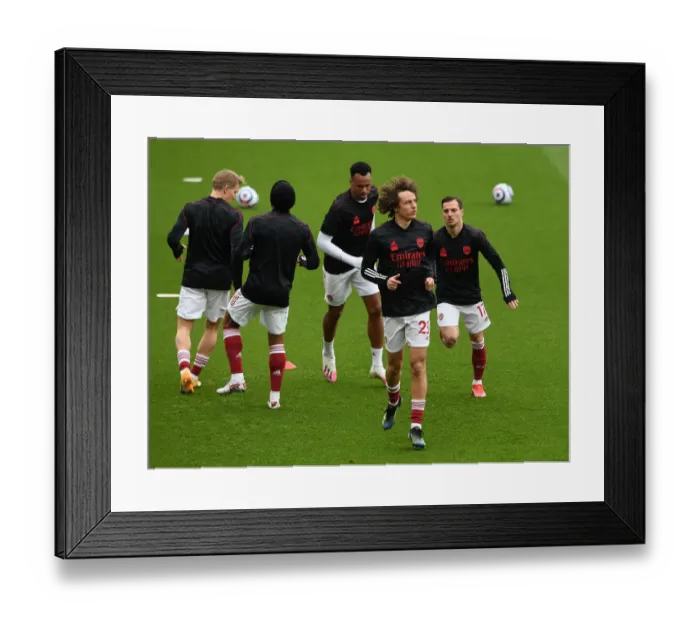 Framed Print : Arsenal vs. Tottenham: David Luiz Warming Up Ahead of Premier League Clash at Emirates Stadium