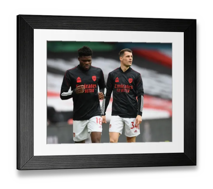 Framed Print : Granit Xhaka: Arsenal's Battle-Ready Midfielder Gears Up for Tottenham Showdown