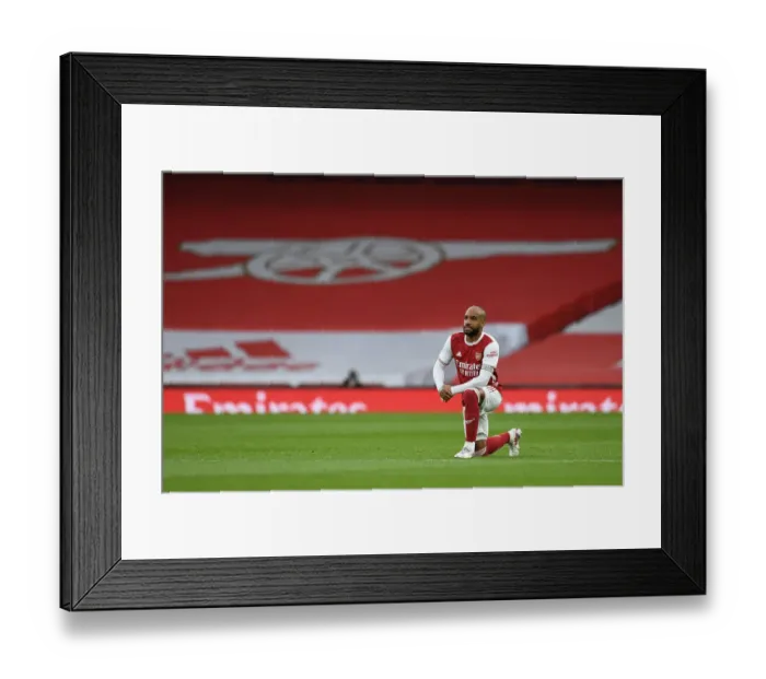 Framed Print : Arsenal's Alexandre Lacazette Takes a Knee During Arsenal v Tottenham Premier League Match