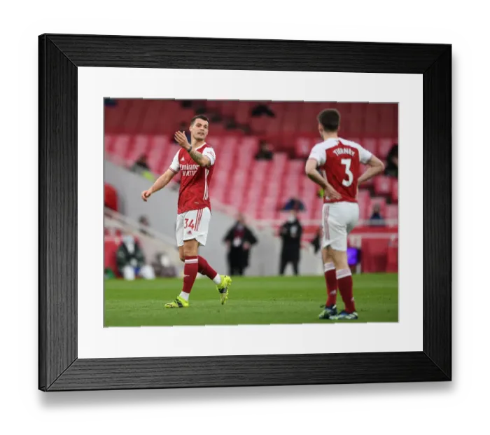 Framed Print : Arsenal's Granit Xhaka Faces Off Against Tottenham in Premier League Rivalry, London 2021