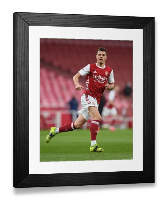 Framed Print : Granit Xhaka: Arsenal vs. Tottenham Premier League Showdown, London 2021