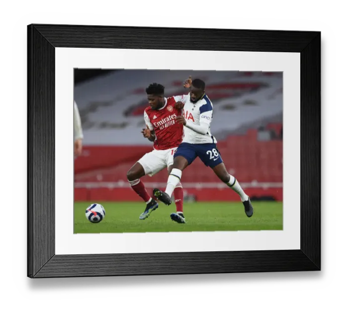 Framed Print : Partey vs. Ndombele: A Premier League Rivalry Ignites at Emirates Stadium Framed Print : Partey vs. Ndombele: A Premier League Rivalry Ignites at Emirates Stadium
