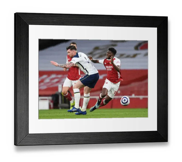 Framed Print : Arsenal vs. Tottenham: Intense Battle Between Partey and Hojbjerg in the Premier League