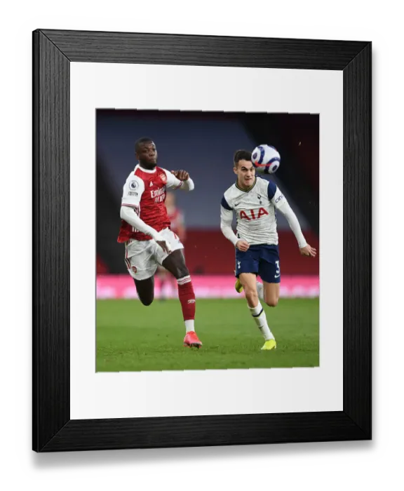 Framed Print : Pepe vs. Reguilon: A Battle of Wits in the Arsenal vs. Tottenham Rivalry Framed Print : Pepe vs. Reguilon: A Battle of Wits in the Arsenal vs. Tottenham Rivalry