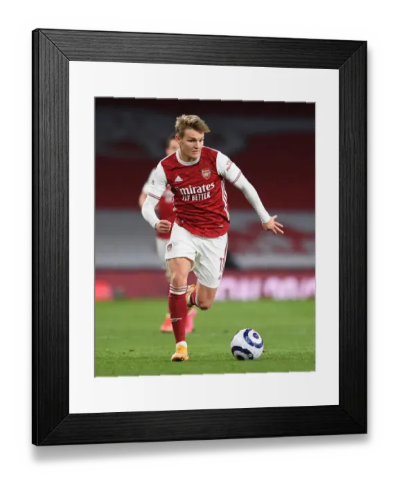 Framed Print : Martin Odegaard vs. Tottenham: Clash of the Premier League Rivals Framed Print : Martin Odegaard vs. Tottenham: Clash of the Premier League Rivals