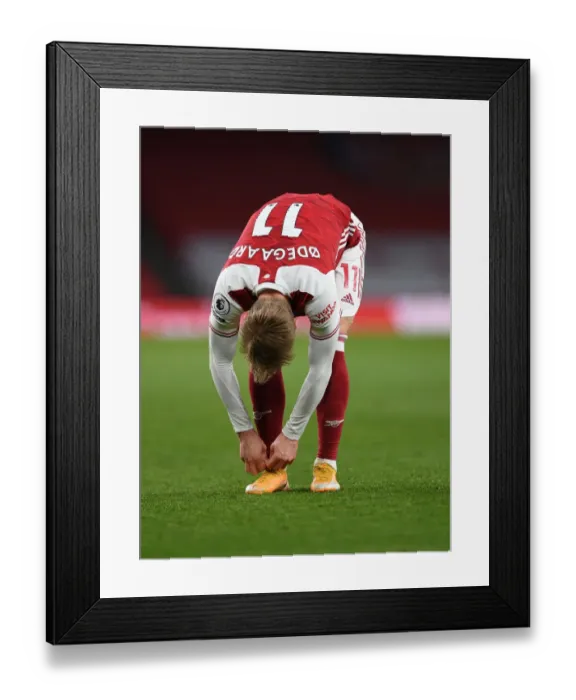 Framed Print : Martin Odegaard vs. Tottenham: A Riveting Clash in the Premier League