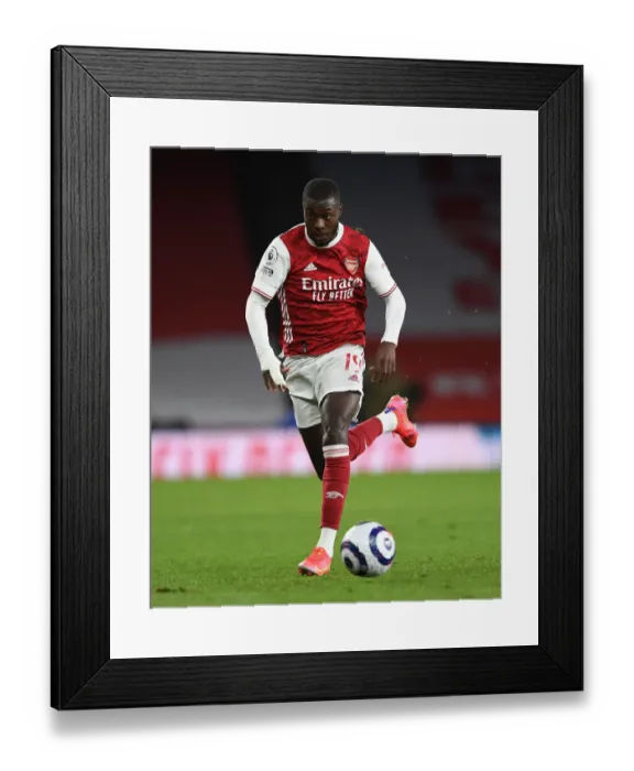 Framed Print : Pepe vs. Tottenham: Intense Head-to-Head Clash in Arsenal's Premier League Showdown