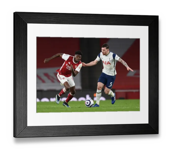 Framed Print : Battle of the Midfielders: Partey vs. Hojbjerg - Arsenal vs. Tottenham Rivalry in the Premier League Framed Print : Battle of the Midfielders: Partey vs. Hojbjerg - Arsenal vs. Tottenham Rivalry in the Premier League