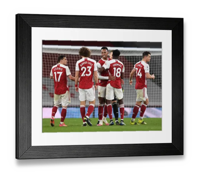 Framed Print : Arsenal's Gabriel Magalhaes Celebrates Victory Over Tottenham in the Premier League