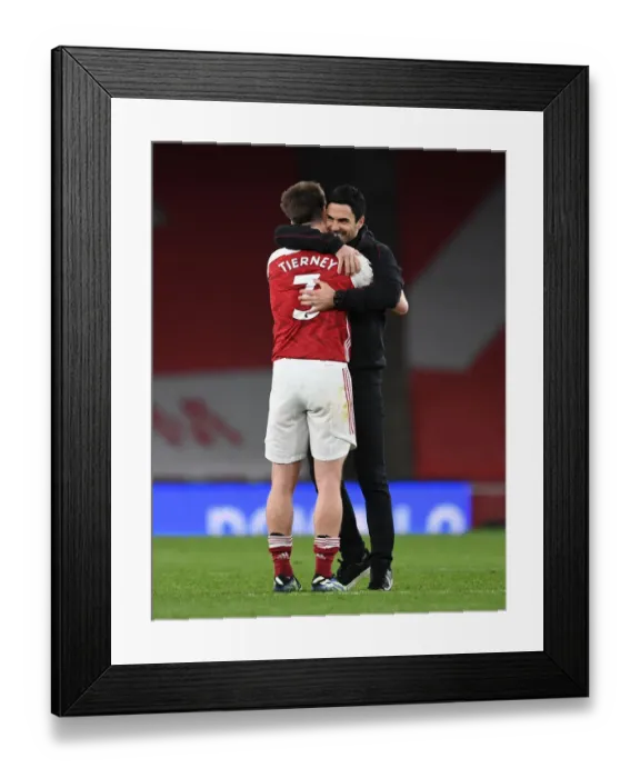 Framed Print : Arsenal: Arteta Comforts Tierney After Intense Arsenal vs. Tottenham Clash Framed Print : Arsenal: Arteta Comforts Tierney After Intense Arsenal vs. Tottenham Clash