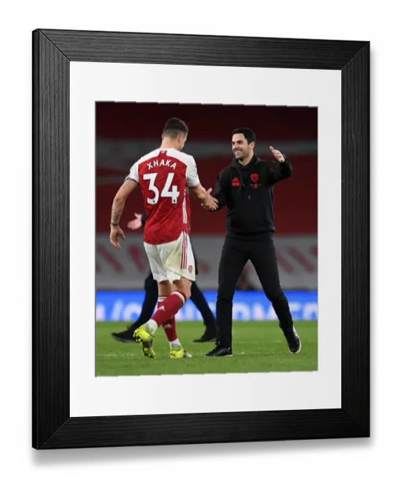 Framed Print : Arsenal's Mikel Arteta and Granit Xhaka Celebrate Victory Over Tottenham