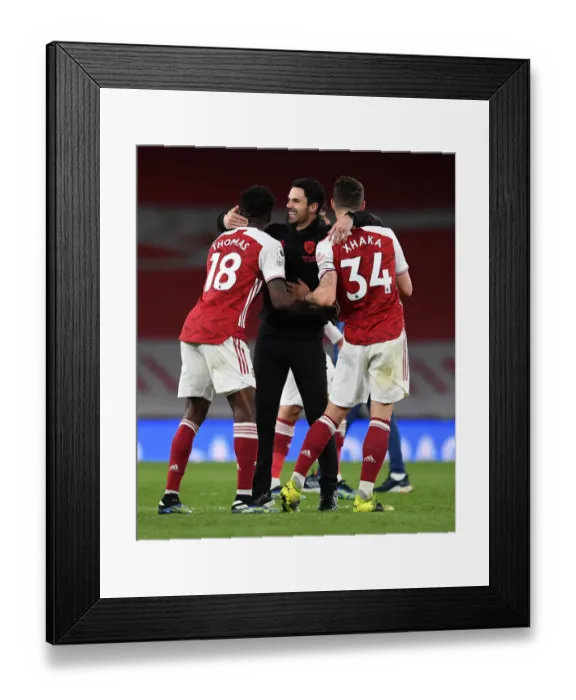 Framed Print : Arsenal's Glory: Arteta Celebrates with Partey and Xhaka after Beating Tottenham