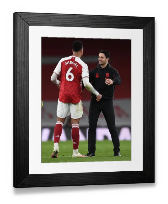 Framed Print : Arsenal's Mikel Arteta and Gabriel Magalhaes Celebrate Victory over Tottenham Hotspur Framed Print : Arsenal's Mikel Arteta and Gabriel Magalhaes Celebrate Victory over Tottenham Hotspur
