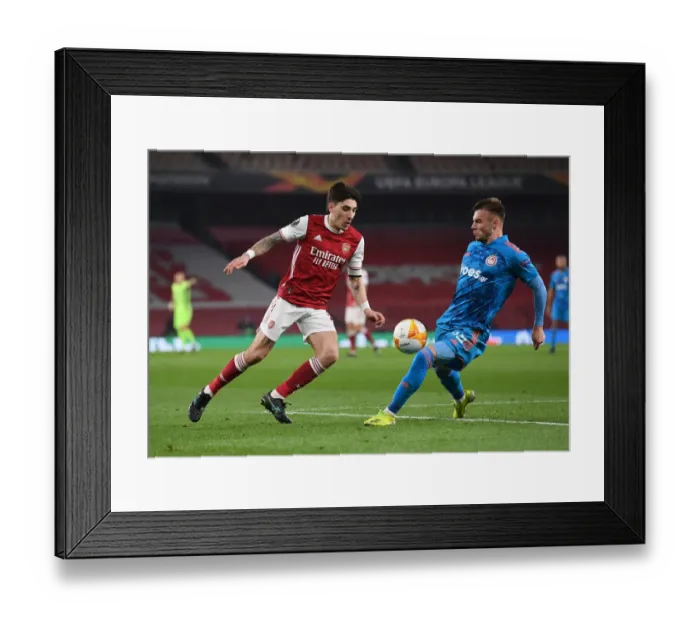 Framed Print : Arsenal vs Olympiacos: Hector Bellerin Clashes in Empty Emirates Stadium - UEFA Europa League 2020-21