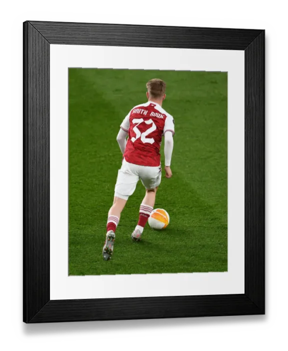 Framed Print : Emile Smith Rowe Shines in Empty Emirates: Arsenal's Standout Performance Against Olympiacos in UEFA Europa League 2021 Framed Print : Emile Smith Rowe Shines in Empty Emirates: Arsenal's Standout Performance Against Olympiacos in UEFA Europa League 2021