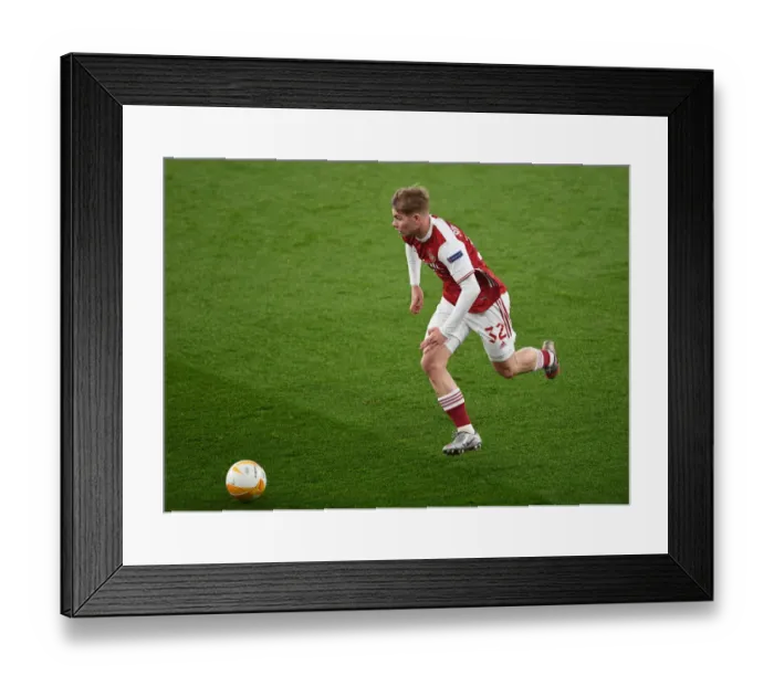 Framed Print : Emile Smith Rowe Shines: Arsenal's Europa League Triumph Over Olympiacos in Empty Emirates