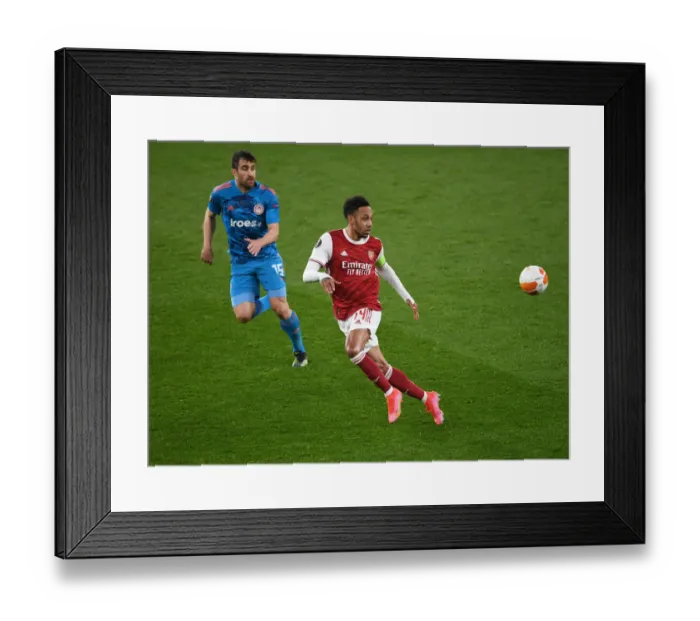 Framed Print : Arsenal's Aubameyang Faces Off Against Olympiacos in Empty Europa League Clash Framed Print : Arsenal's Aubameyang Faces Off Against Olympiacos in Empty Europa League Clash
