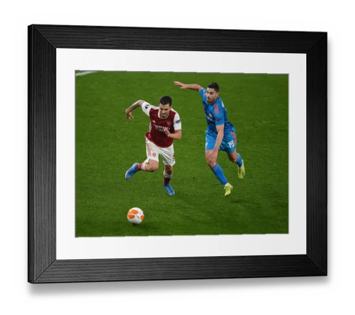 Framed Print : Arsenal vs Olympiacos: Empty Seats Showdown - Europa League 2021, Arsenal's Battle at the Ghostly Emirates Stadium, London