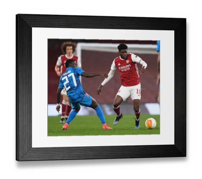 Framed Print : Arsenal vs Olympiacos: Thomas Partey Clash in Empty Emirates Stadium - UEFA Europa League Round of 16
