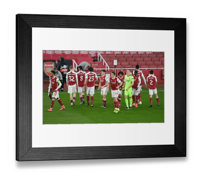 Framed Print : Arsenal's Granit Xhaka: Pre-Match Focus at Empty Emirates Stadium in Europa League Clash Against Olympiacos