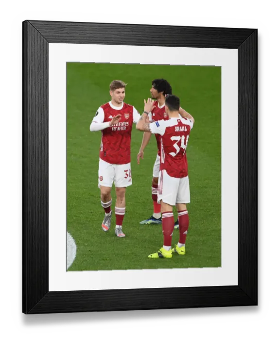 Framed Print : Arsenal Duo Smith Rowe and Xhaka Prepare for Olympiacos Showdown in Empty Emirates Stadium - UEFA Europa League 2020-21