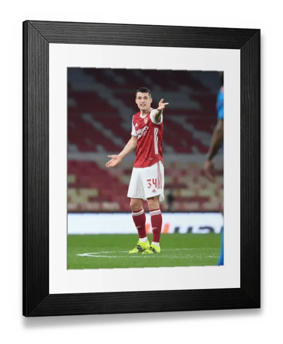 Framed Print : Lone Warrior Xhaka: Arsenal's Battle in Empty Europa League Arena vs Olympiacos Framed Print : Lone Warrior Xhaka: Arsenal's Battle in Empty Europa League Arena vs Olympiacos