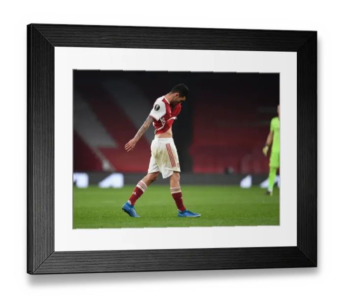 Framed Print : Empty Seats Battle: Arsenal vs Olympiacos at the Ghostly Emirates Stadium - Europa League Round of 16, 2021